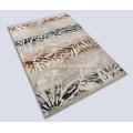 Microfiber tufted carpet with abstract design